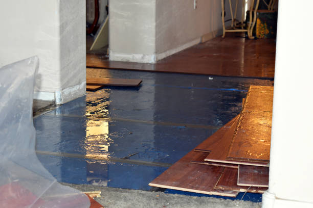Professional Emergency Water Damage Restoration technician working in Rumford, ME